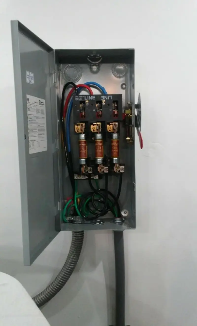 Three-phase disconnect switch installed for Smoke Detector Installation in Grand Bay